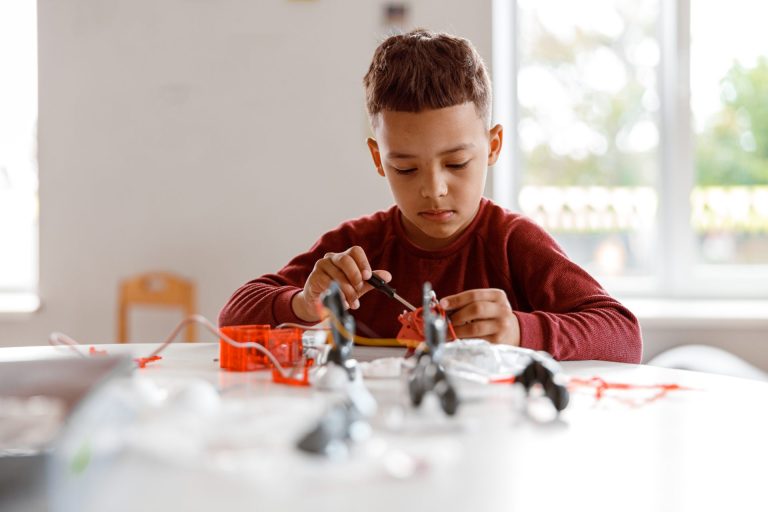 kid-constructing-model-with-constructor-details-in-2022-02-23-01-37-03-utc