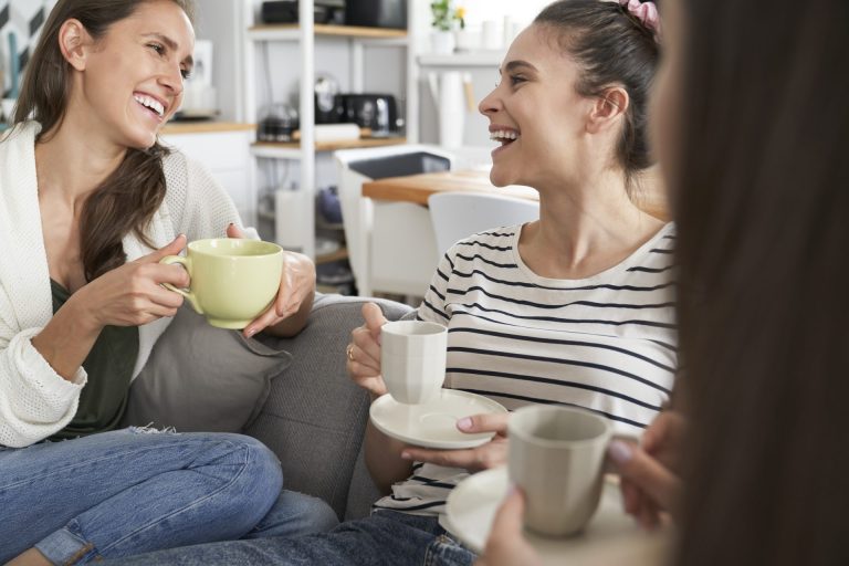 three-young-females-friends-chatting-over-coffee-2021-08-28-22-00-34-utc